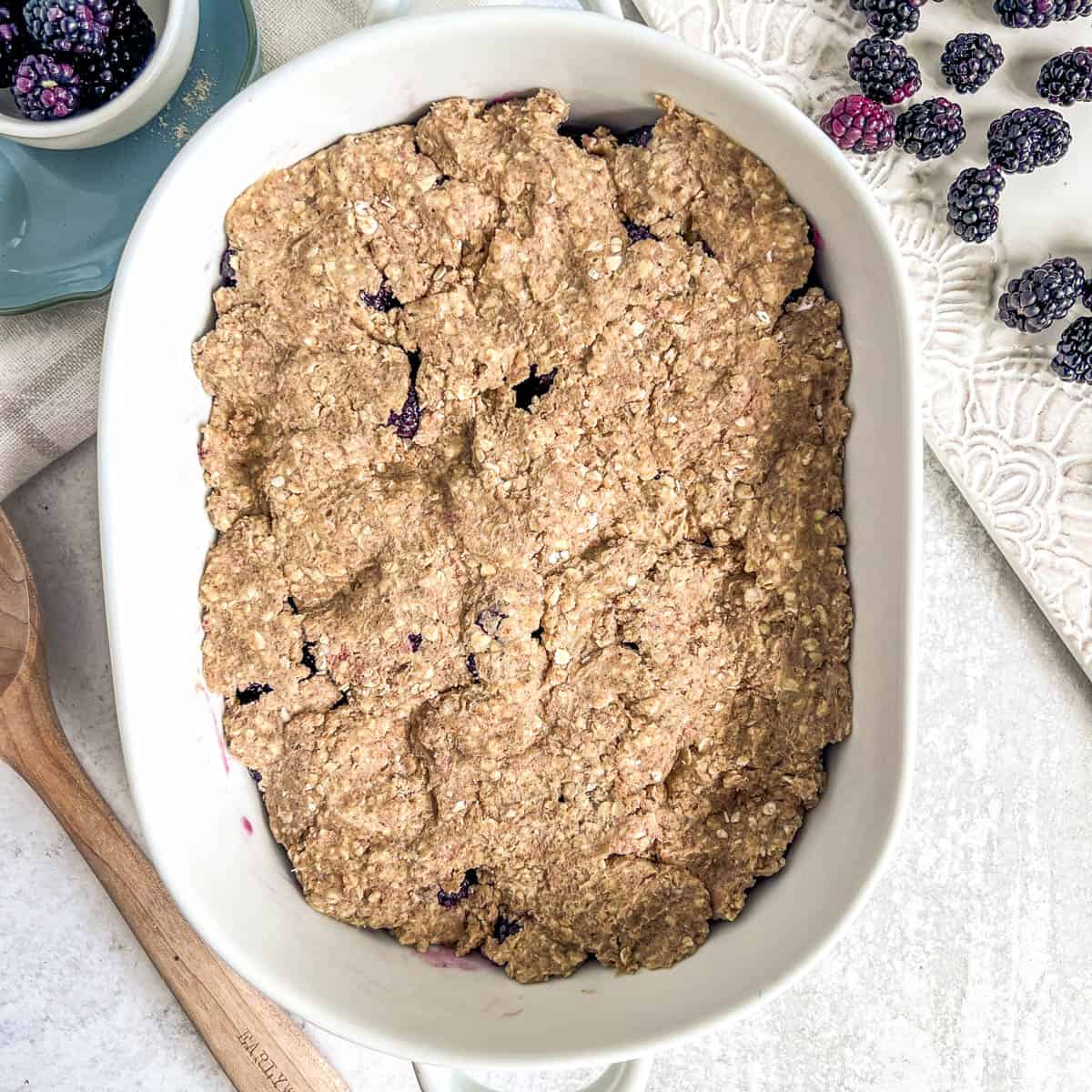 Blackberry Cobbler in white baking dish