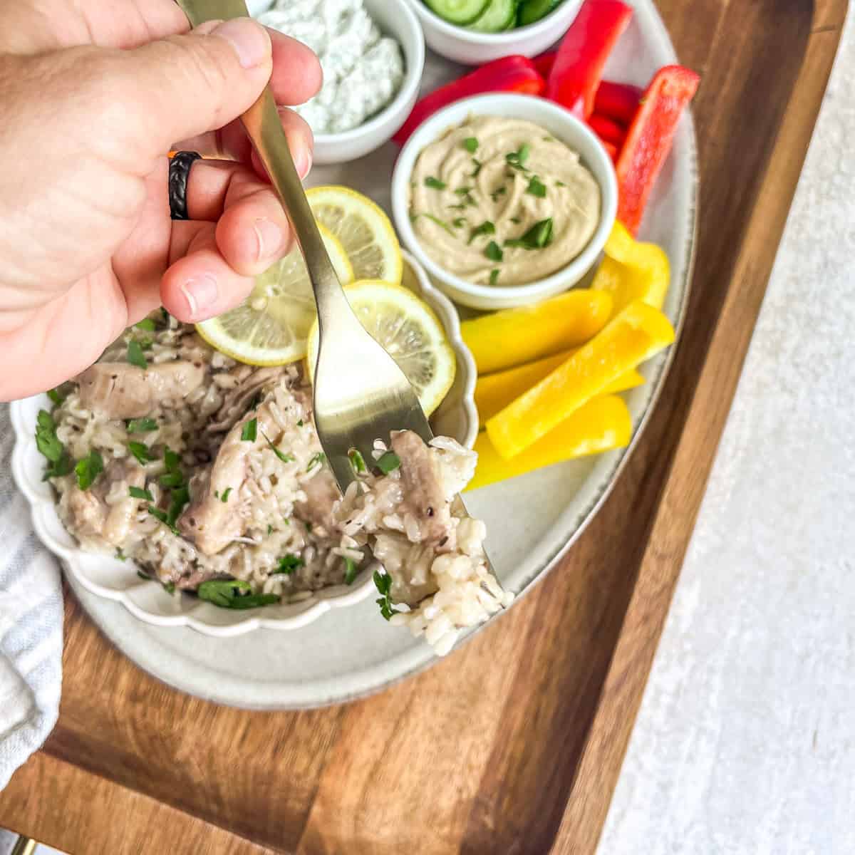 Instant Pot Greek Chicken & Rice on a fork