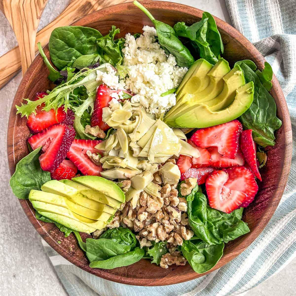 Strawberry Walnut Salad ingredients in a bowl