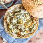 Hot spinach dip in bread bowl