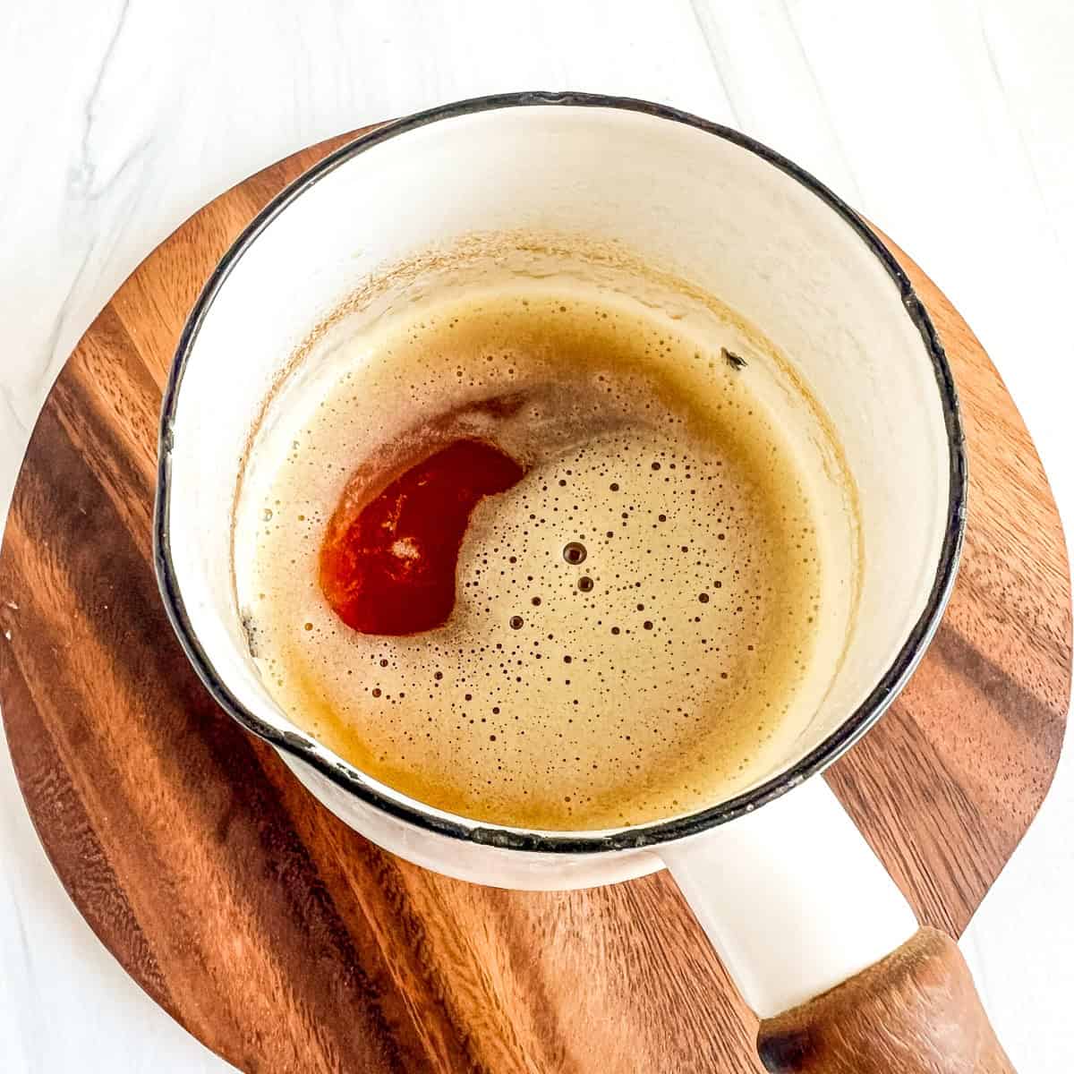 baked peaches browned butter in small pot