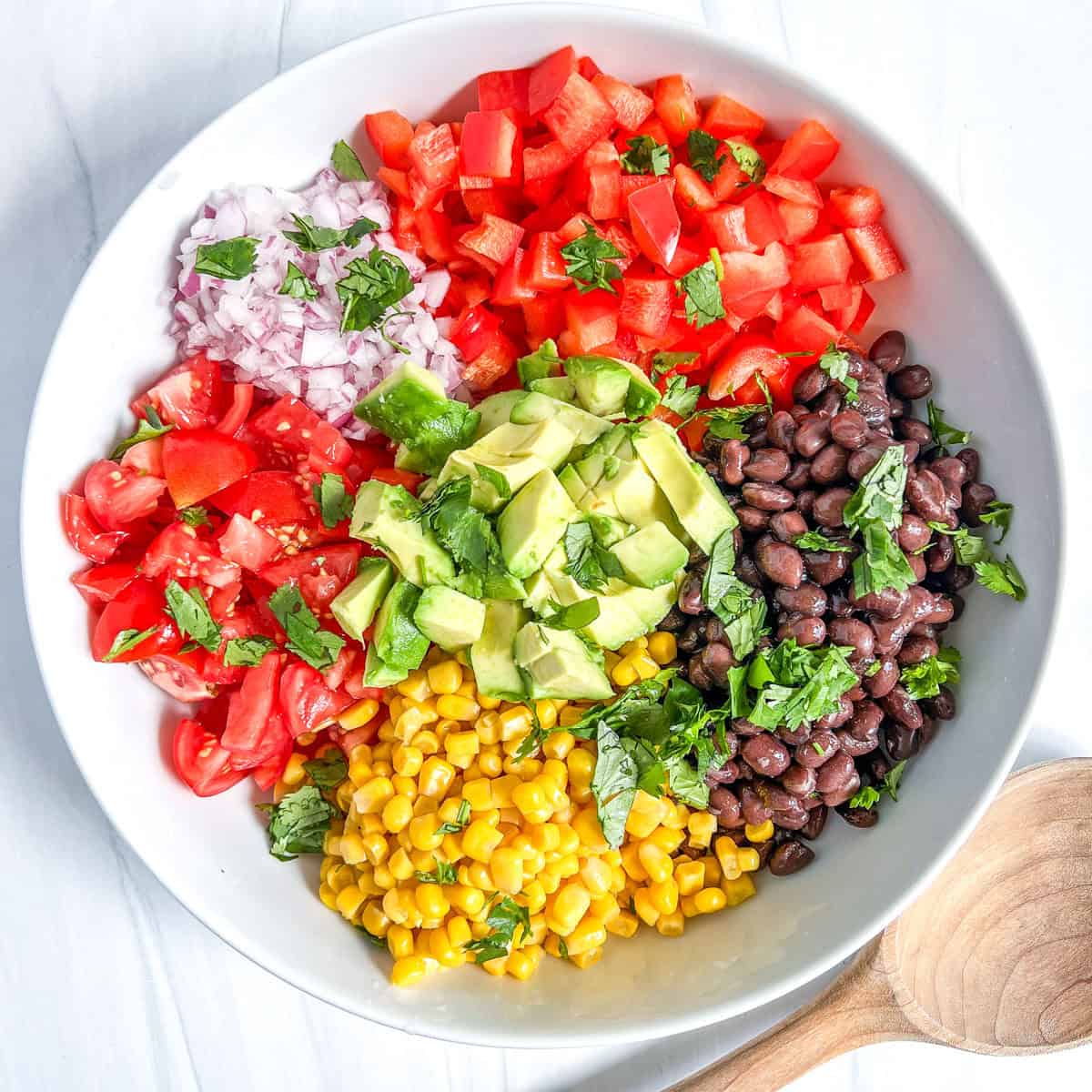 black bean & corn salsa ingredients in a bowl