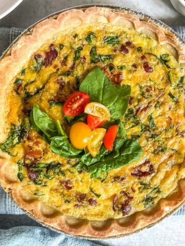easy quiche baked with spinach on top