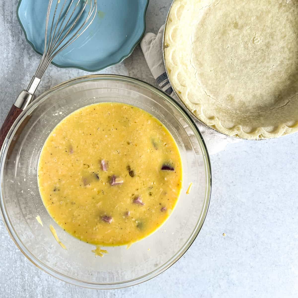 easy quiche recipe ingredients in a bowl