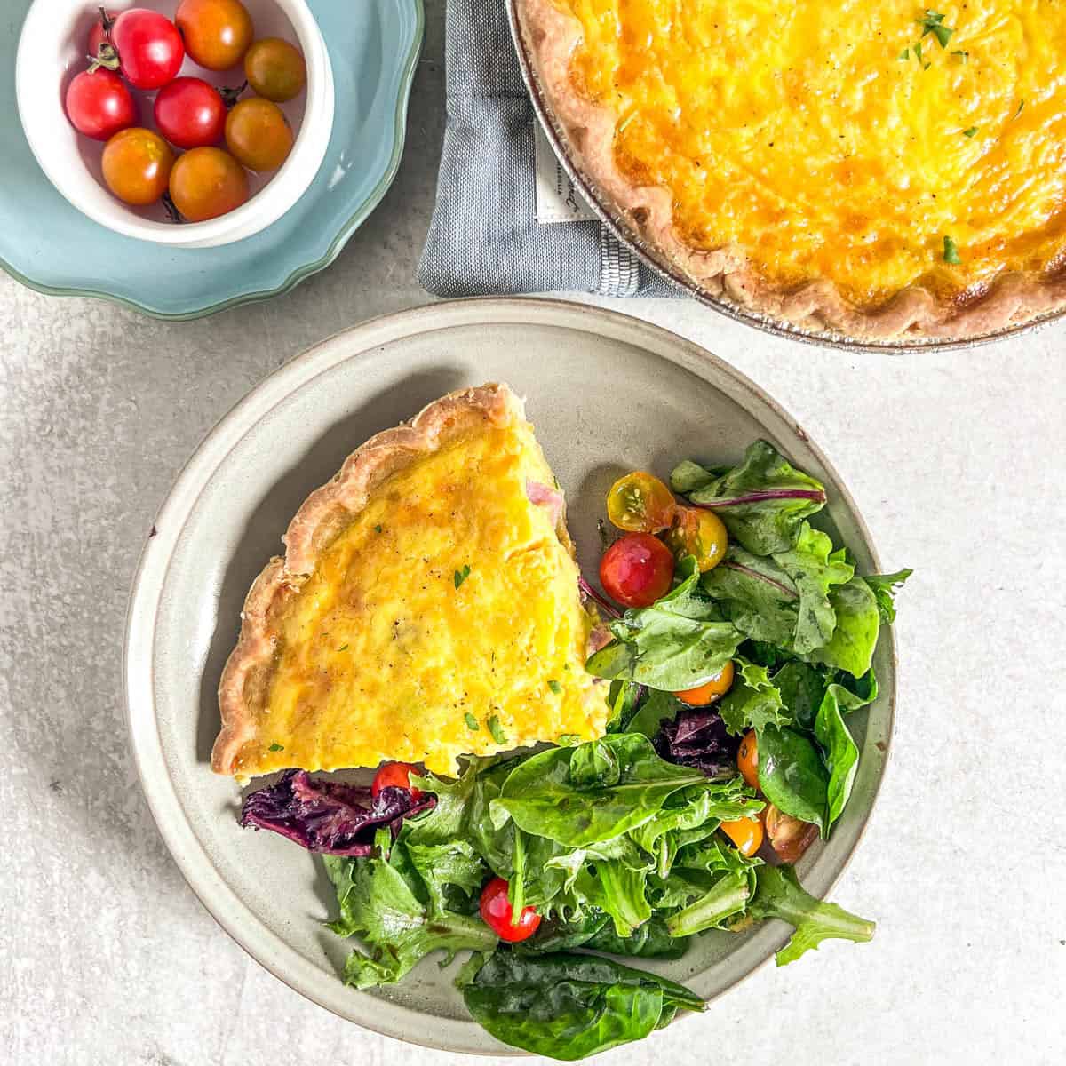 easy quiche recipe piece on a plate