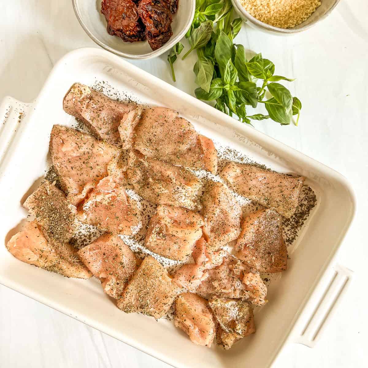 Easy Marry Me Chicken Recipe raw chicken in a pan