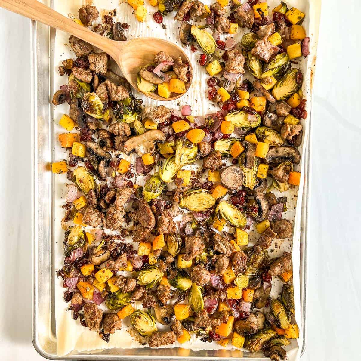 Fall Breakfast Hash on a pan with wood spoon