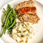 best meatloaf recipe on a white plate