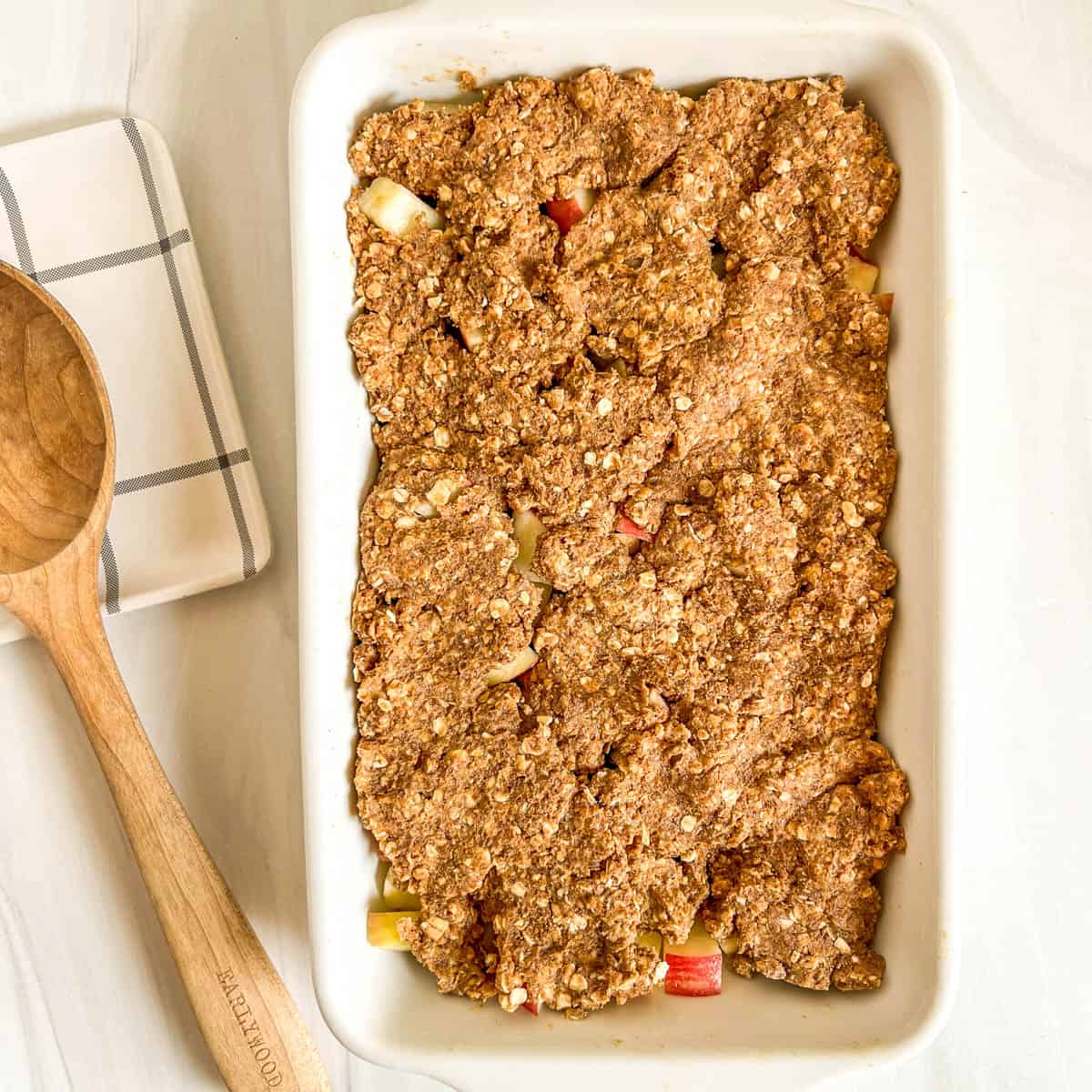 apple cobbler in a baking dish unbaked