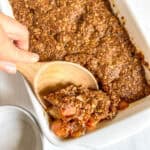 apple dessert with wood spoon