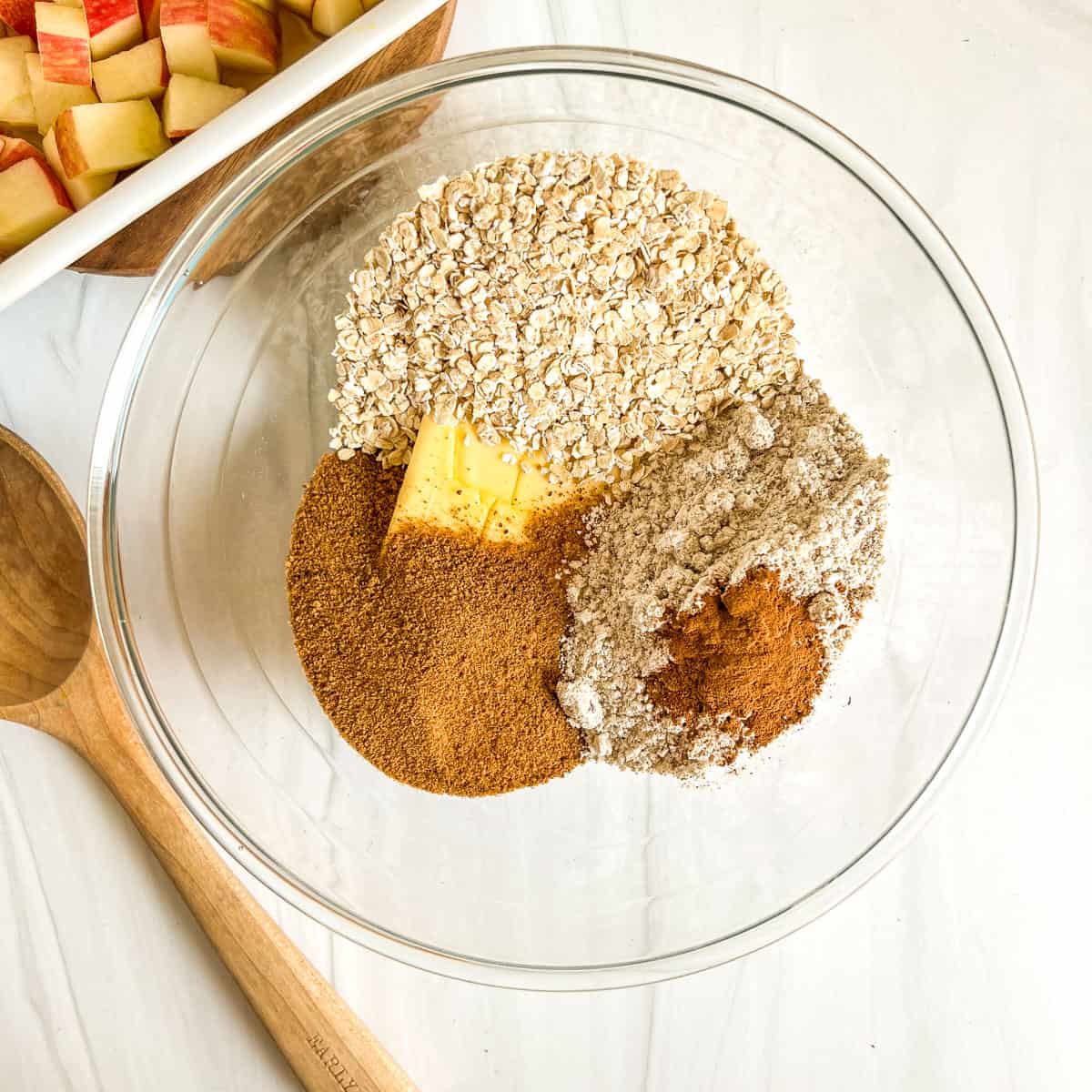 diced apple in a white dish