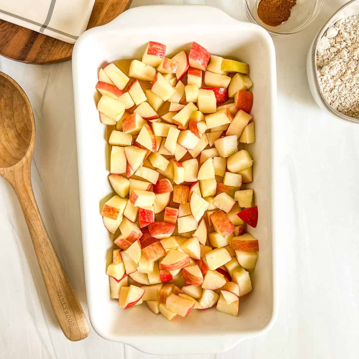 diced apple in a white dish