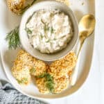 fish sticks and a bowl of tartar sauce
