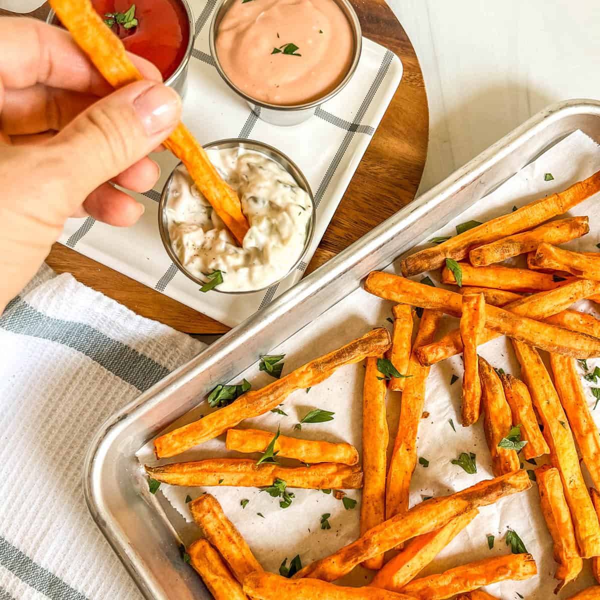 sweet potato fries dipped in tartar sauce