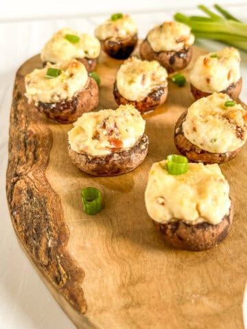 stuffed mushrooms on a board