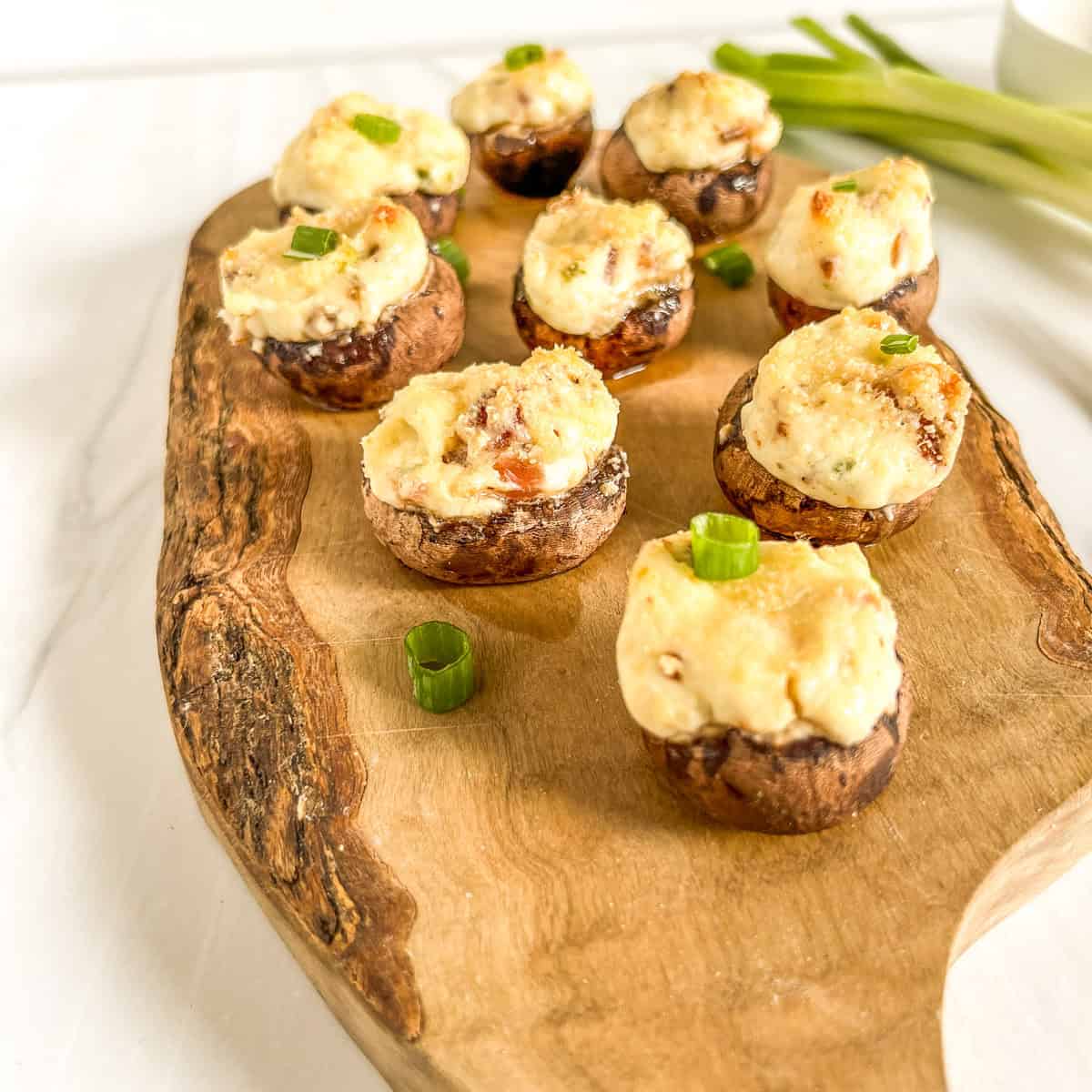 stuffed mushrooms on a board