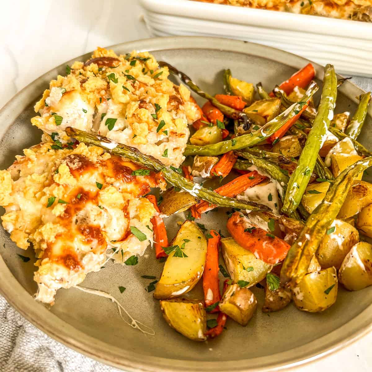 caesar chicken and rice with side of vegetables