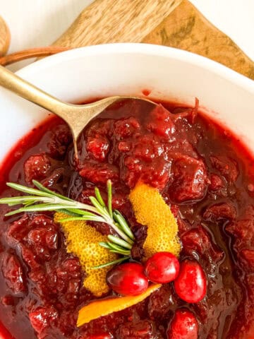 cranberry sauce with spoon in it