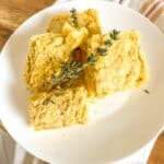 squares of cornbread on a glass plate