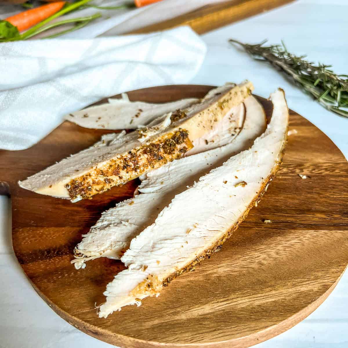 piece of white meat on wood board
