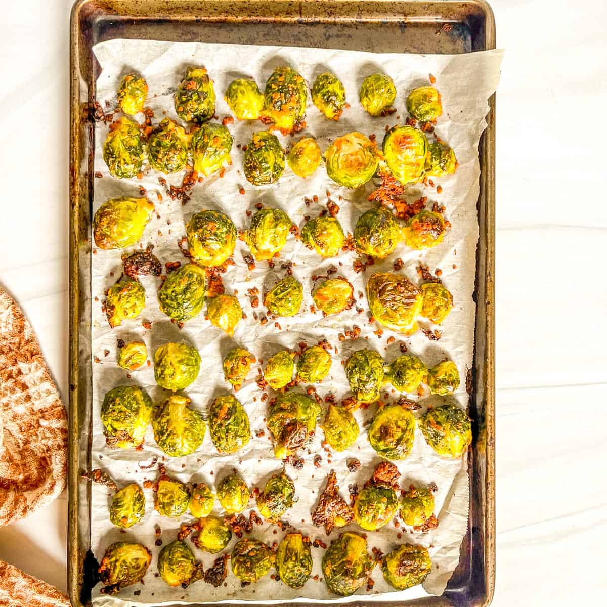 roasted brussel sprouts baked on a baking sheet