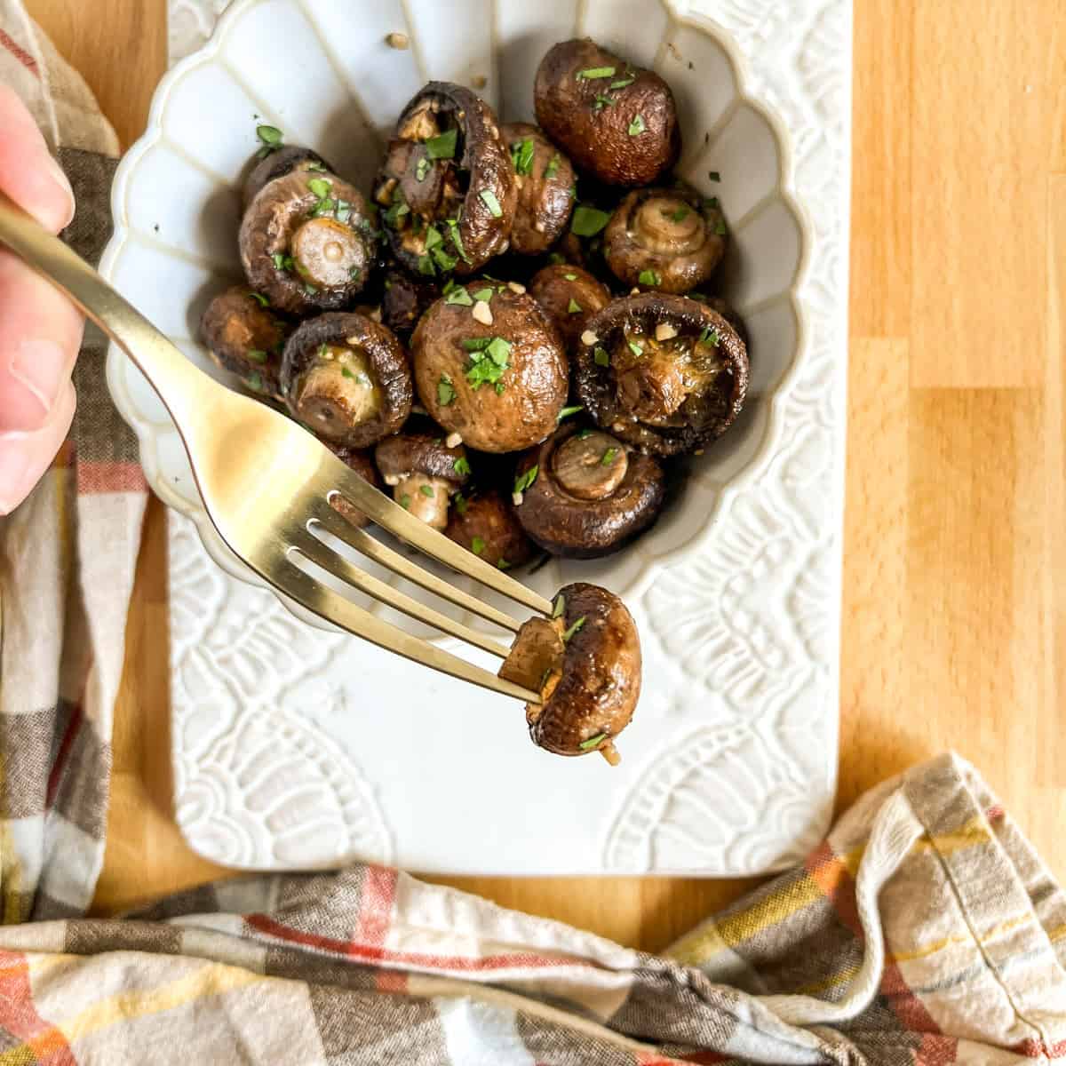 roasted mushroom bite on a fork