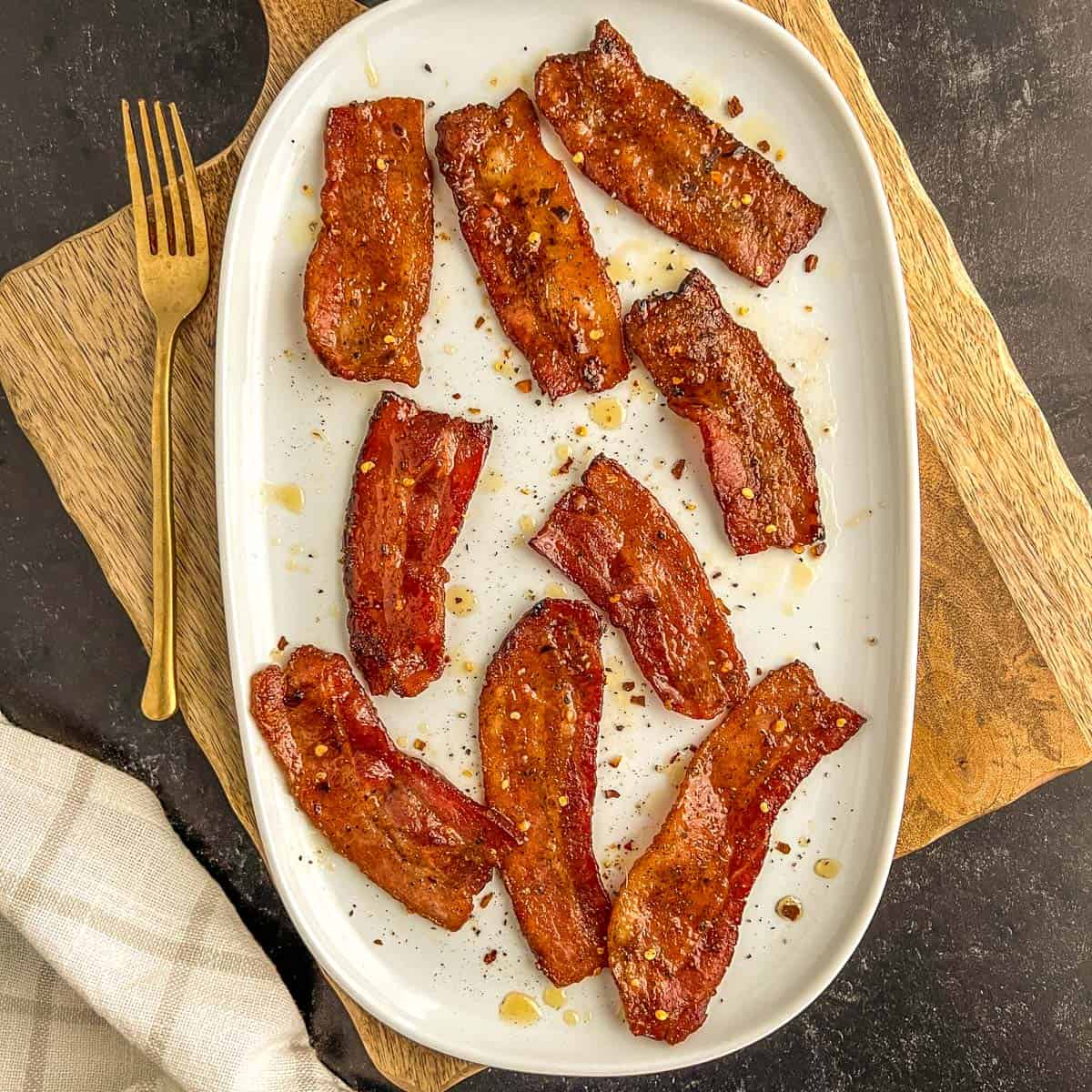 million dollar bacon on a glass plate