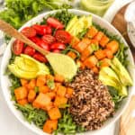 dressing on spoon in salad