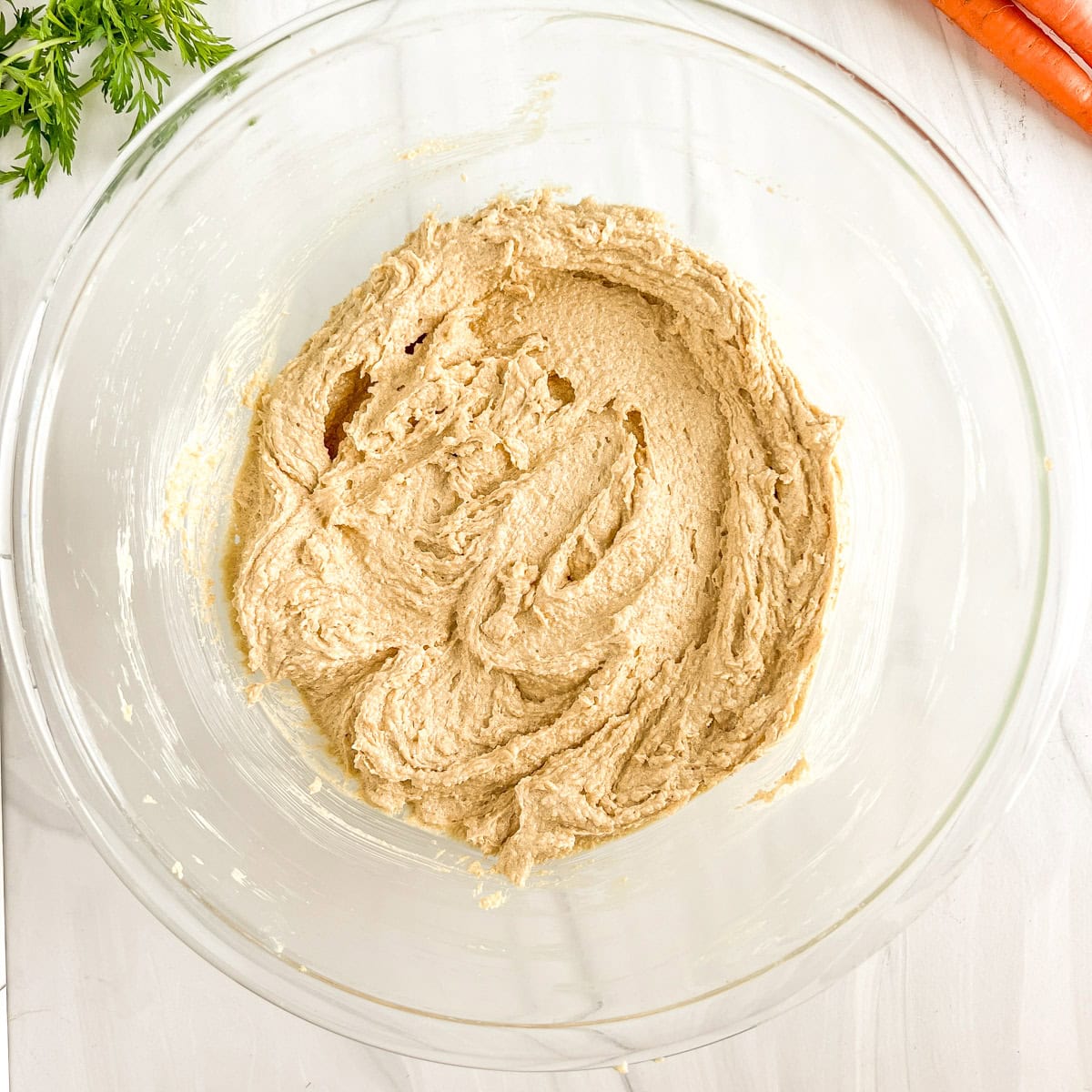 butter and sugar mixed in a bowl