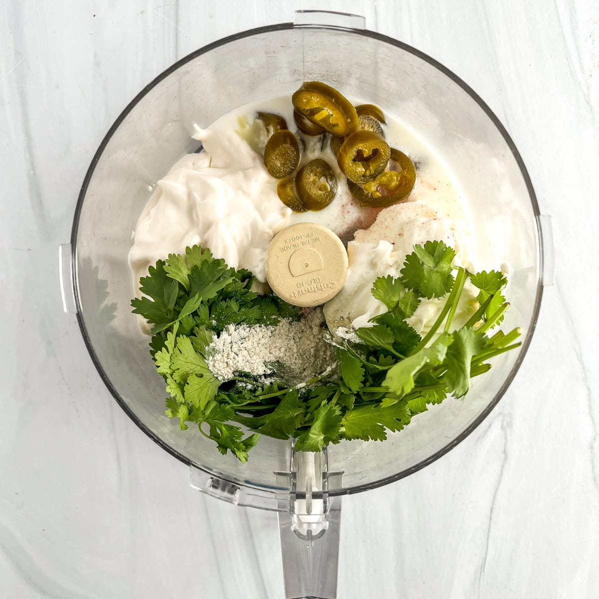 chuys jalapeno ranch dip ingredients in a food processor