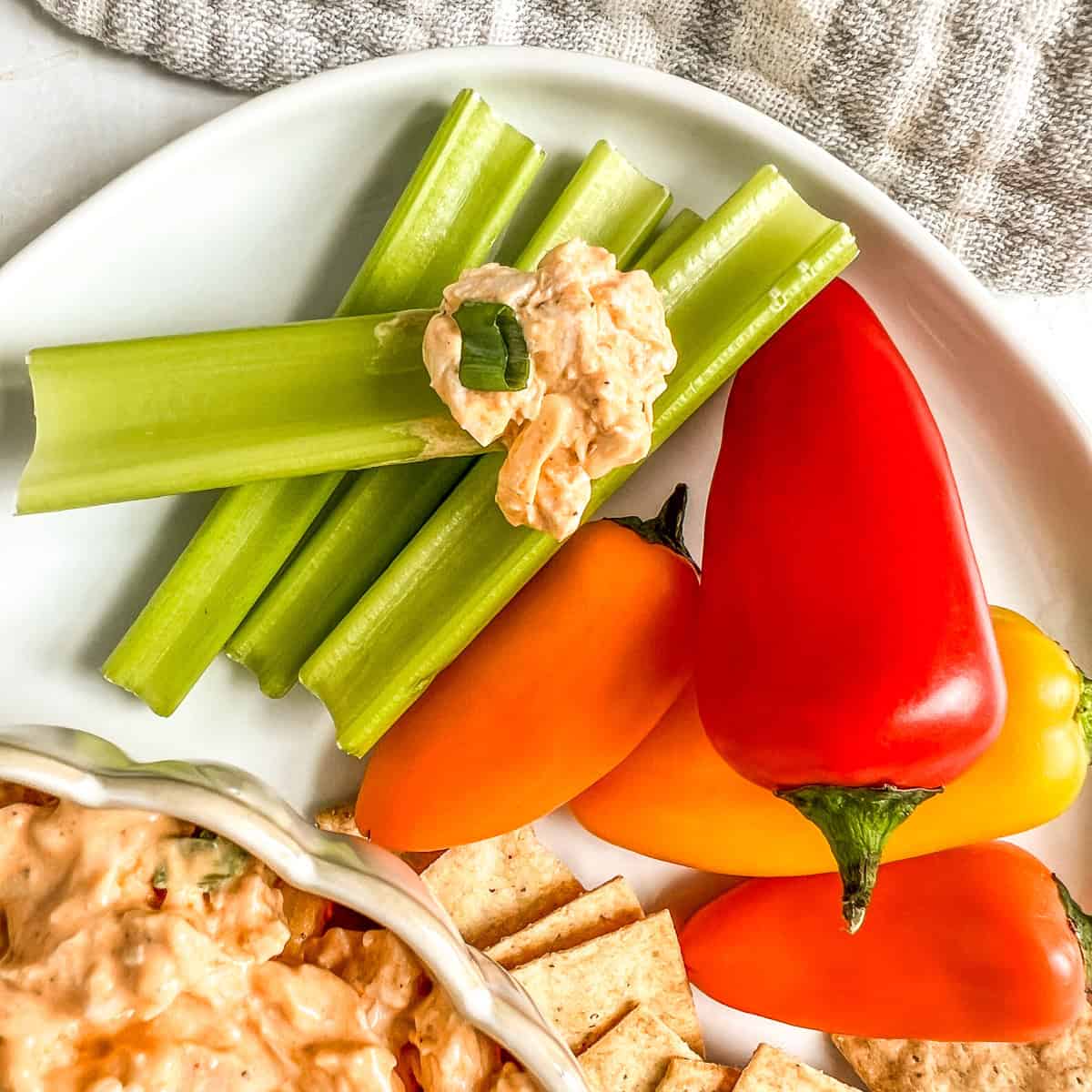 creamy chicken dip on celery